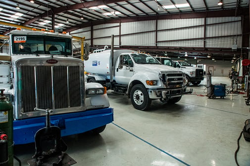 Lineup of Niece water trucks